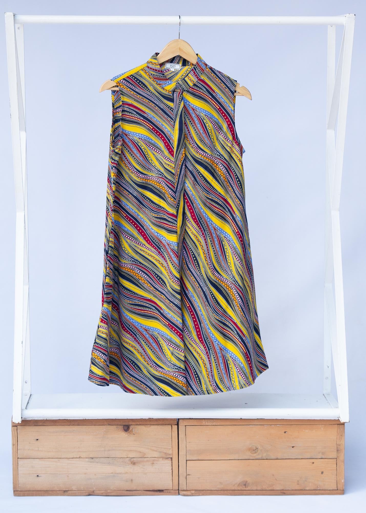 Display of  multi-colored abstract print dress